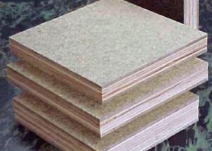 Square pieces of Tempered Hardboard laid on a surface