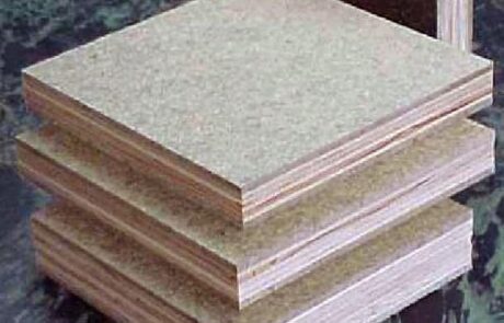 Square pieces of Tempered Hardboard laid on a surface