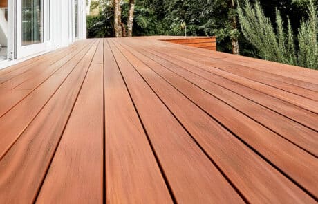 Outdoor low to the ground view of Black Label Wood Decking on patio
