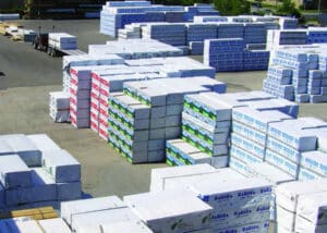 Pallets of framing material and studs in North Star Forest Materials lumber yard