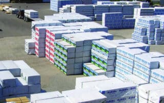 Pallets of framing material and studs in North Star Forest Materials lumber yard