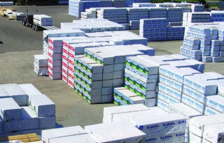 Pallets of framing material and studs in North Star Forest Materials lumber yard