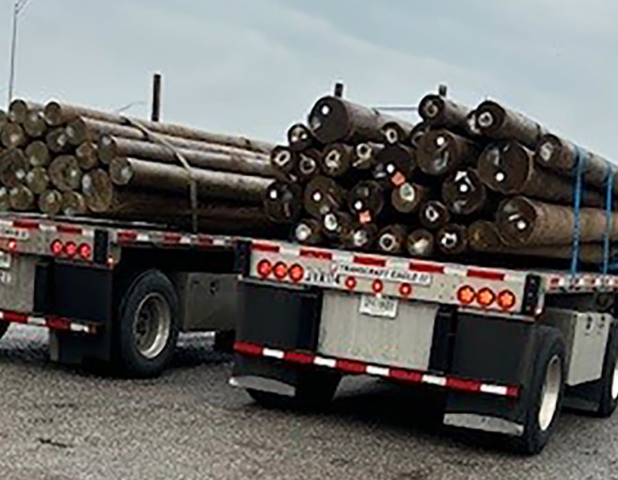 Utility Poles bundled and loaded on Truck