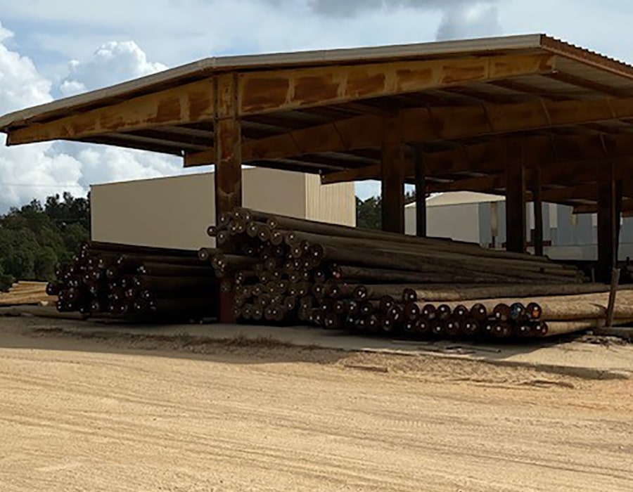 Bundles of utility poles under an outdoor surface