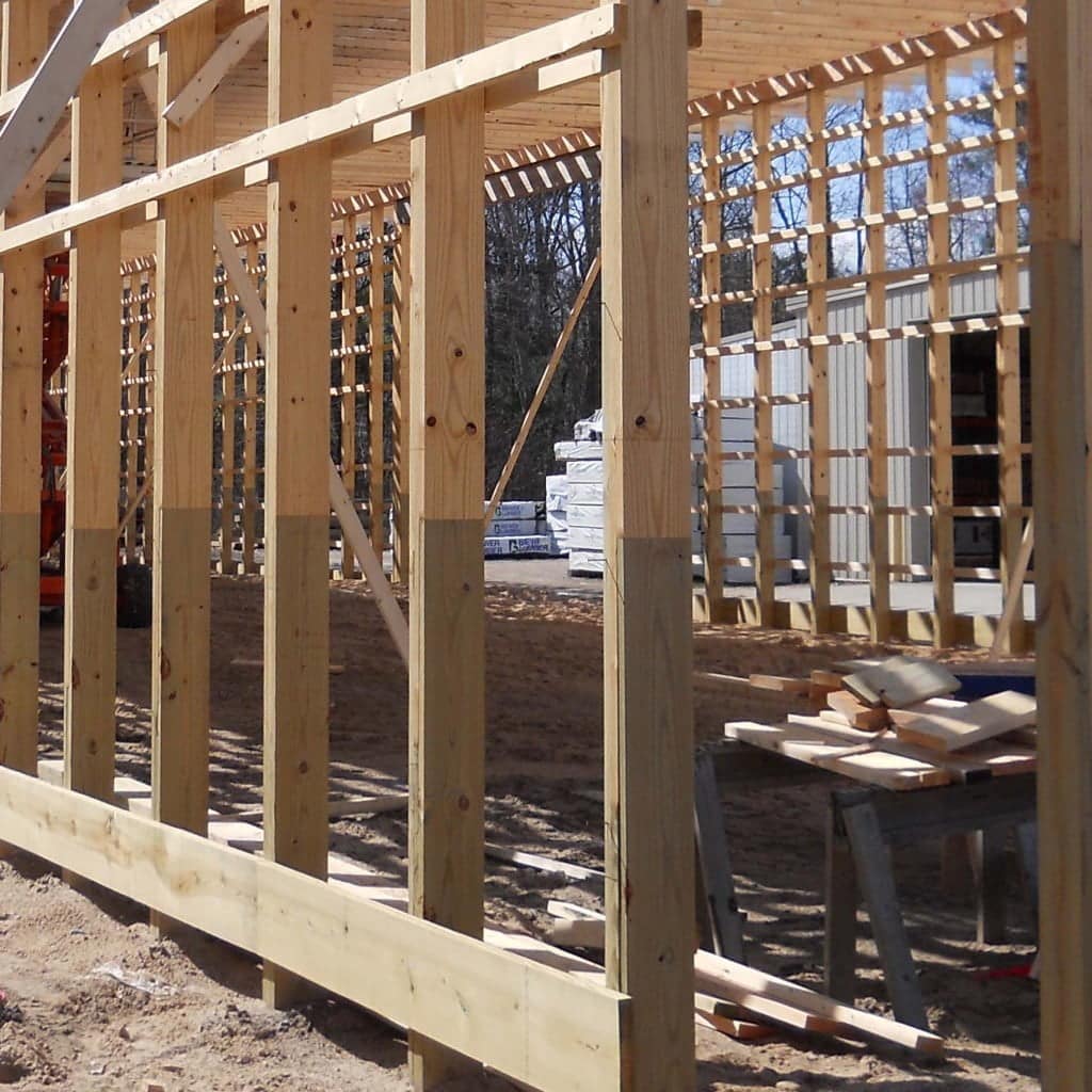 Glulam post frame columns in application.